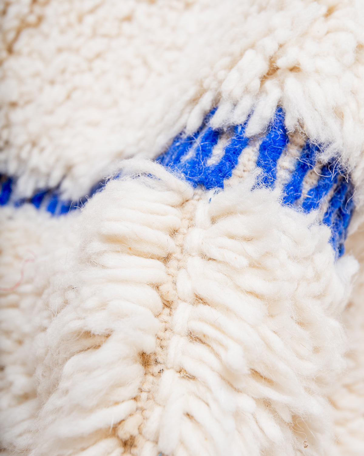 Modern, designer, handcrafted Berber rug from Morocco. Beniourain carpet with beautiful colours and patterns and fluffy wool texture.